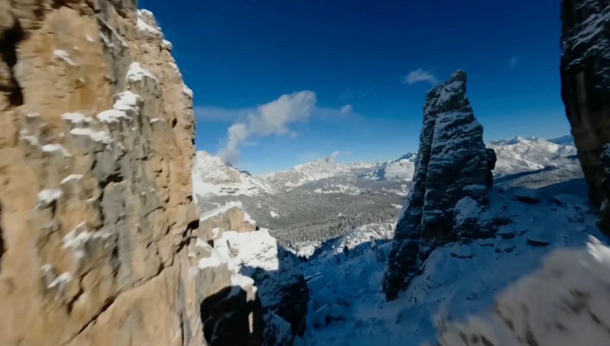 Panoramic drone view of snow-covered Dolomite mountains Milan Cortina 2026 Olympics